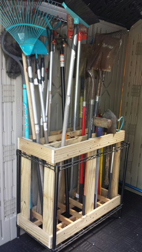 Storage for yard tools Storage For Yard Tools, Gardening Equipment Storage, Shovel Holder Tool Storage, Yard Tools Storage Ideas, Weedeater Storage Ideas, Tool Rack Ideas, Yard Tool Organization, Mower Storage Ideas, Small Shed Organization Ideas