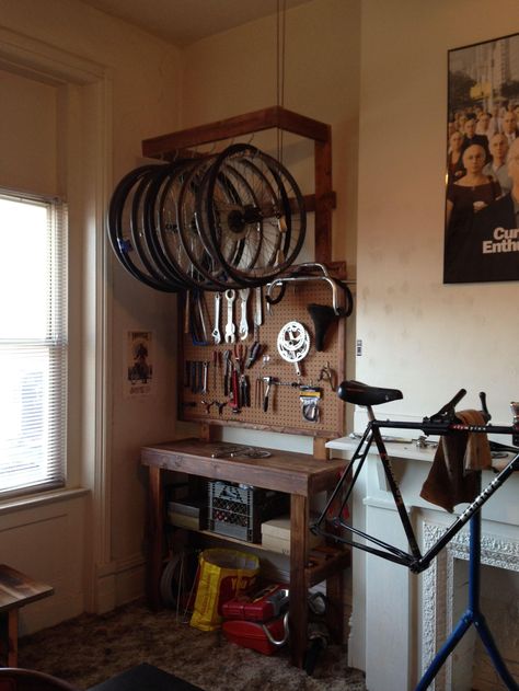 Home Bike Workshop, Bike Workshop, Bicycle Room Design, Exercise Bike Desk Diy, Bicycle Workshop, Bicycle Workshop Design, Small Woodworking Shop Ideas, Bikeshop Bicycle Store, Bicycle Room