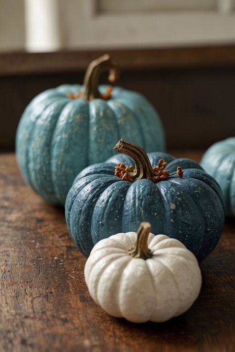 Transform your living space with a touch of whimsy using blue pumpkins as a stunning centerpiece or playful accent. Perfect for adding a unique and stylish twist to your decor. #HomeDecor #BluePumpkins #InteriorDesign #FallDecor #UniqueDecor #StylishHome #SeasonalDecor #PumpkinDecor #DecorInspiration Navy Blue Pumpkins, Pumpkin Carving Painting, Blue Pumpkin Decor, Traditional Fall Decor, Pumpkin Inspiration, Pumpkin Decorating Ideas, Autumn Diy, Carving Painting, Fall Pumpkin Decor