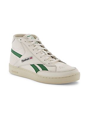 From the Club C Form Hi Collection. Crafted of leather, Reebok’s Chalk sneakers are styled with a round toe and logo branding at the side..Leather upper.Round toe.Lace-up style.Textile lining.Rubber sole.Imported..SIZE..True to size.Heel, 1.18 (30 mm).Platform height, 0.98 (25 mm). Reebok High Tops, Leather Reebok, Reebok Club C, Club C, The Club, Up Styles, Online Purchase, Logo Branding, High Top