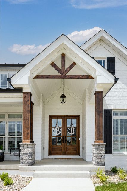 Front Porch With Wood Beams, Arched Entryway Exterior, Front Gable Porch Entrance, Wood Gables Exterior, Dormers Ideas Exterior, Exterior Arches, Front Entryway Ideas Exterior, Gables On House Exterior, House Exterior Trends