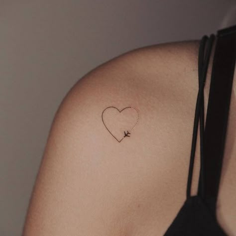 Infinity Airplane Tattoo, Tattoo Ideas Airplane, Minimalist Tattoo Shoulder, Shoulder Heart Tattoo, Heart On Shoulder Tattoo, Airplain Tattoo, Airplane Heart Tattoo, Minimalistic Heart Tattoo, Small Airplane Tattoo