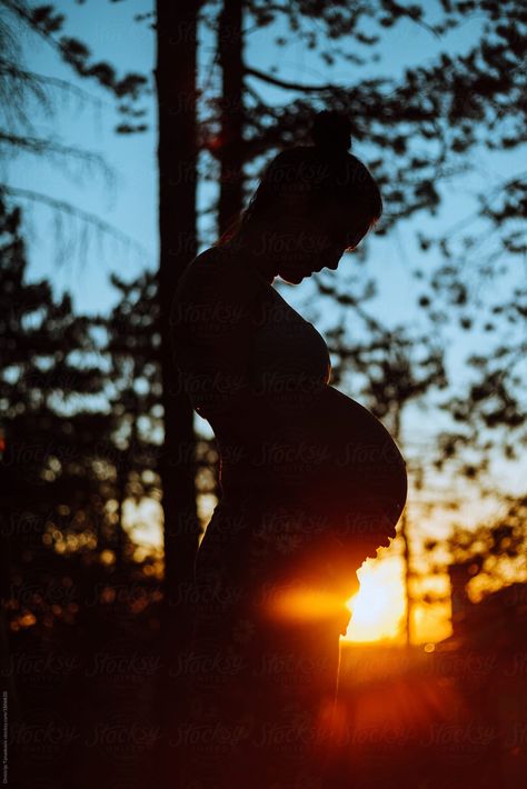 "Pregnant Woman in Forest During Sunset" Download this high-resolution, royalty-free stock photo by Dimitrije Tanaskovic from Stocksy United. Pregnant Forest Photoshoot, Pregnant Nature Photoshoot, Pregnancy Photos In Nature, Forest Pregnancy Photoshoot, Pregnancy Photos Nature, Forest Maternity Photoshoot, Pregnant Women Photography, Woman In Forest, Maternity Photo Poses