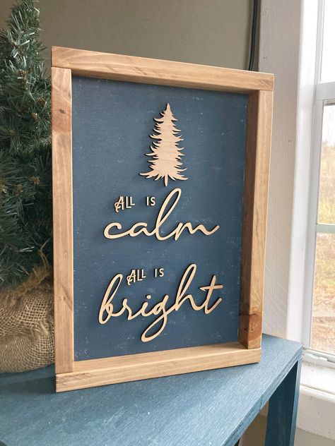 This sign is so striking and beautiful with it's slightly distressed blue background and laser cut natural wood words and pine tree. It comes in multiple sizes which makes it perfect to gift, but you may decide that it's exactly what you need for your own Christmas decor. -Choose your stain color for your frame (see chart in pictures) -Choose your frame size -Choose your sign size (size listed is before your frame is added) Wood signs have natural characteristics that will show through so theref Christmas Decor Navy Blue, Christmas Carol Decorations, Christmas Photoshoot Kids, Navy Blue Christmas, Black White Christmas, Navy Christmas, Blue Christmas Decor, White Christmas Ornaments, Christmas Apartment