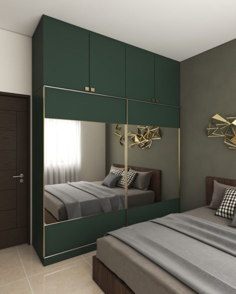 A swathe of dark green on the lower and upper cabinets gives a pleasant vibe to this all-white design.#kitchen #kitchendesign #interiordesign #homedecor #design #interior #kitchendecor #homedesign #homesweethome #renovation #bedroom #kitchenremodel #kitcheninspo #kitchenrenovation #interiordesignerbangalore #luxurykitchen #kitchenwardrobe #tallunit Dark Green Wardrobe Bedroom, Green Cupboards Bedroom, Green Wardrobe Bedroom, Green Brown Bedroom, Cupboard For Bedroom, Green Wardrobe, Renovation Bedroom, Almirah Designs, Green Color Combinations