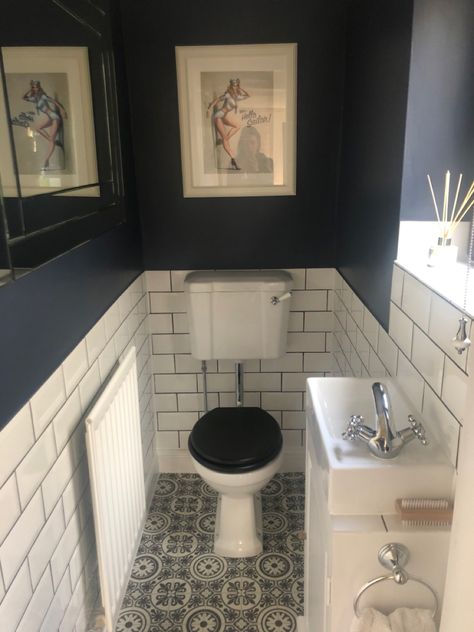 Navy blue wall with vintage sailor print Navy Blue Cloakroom, Navy Downstairs Toilet, Navy Blue Cloakroom Toilet, Dark Blue Downstairs Toilet, Blue Cloakroom Toilet, Dark Blue Cloakroom Toilet, Cloakroom Toilet Ideas, Cloakroom Ideas, Cloakroom Toilet