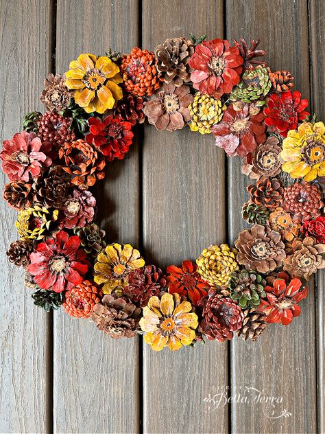 With a plethora of pinecones on the ground, here are 3 different pinecone DIY wreaths. Come and see these 3 stunning designs for the fall. Autumn Pinecone Crafts, Craft With Pinecones, All Natural Fall Decorations, Fall Flower Wreath Diy, Pine Cone Wreath Diy How To Make, Pinecone Wreath Ideas, Fall Pinecone Wreath Diy, Pine Cone Fall Crafts, Diy With Pinecones