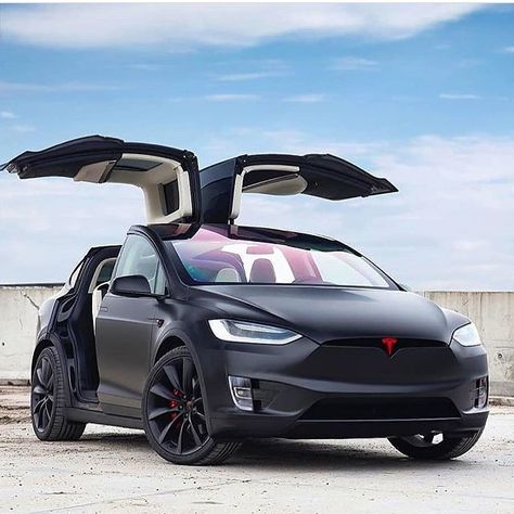 I like the "Back to The Future" style doors on this model. Tesla Wrap, Tesla X, Vehicle Concept, Black Cars, Tesla Owner, Tesla Roadster, Tesla Motors, Tesla Car, Tesla Model X