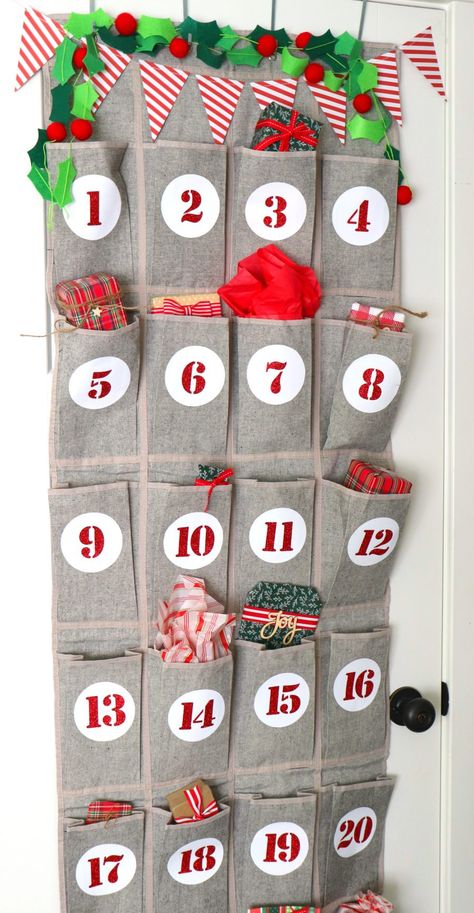 Christmas advent calendar with vinyl Christmas Door Advent Calendar, Advent Calendar Sewing Patterns, Diy Fabric Advent Calendar, Shoe Organizer Advent Calendar, Cricut Advent Calendar, Candy Sleighs, Diy Advent Calendar Ideas, Christmas Advent Calendars, Advent Tree