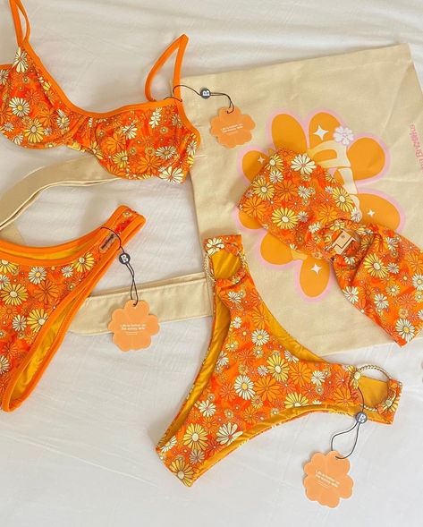 left or right?! whichever you pick, we're defo crushin' over these fresh new kinis 🧡 stay tuned Flower Bathing Suits, Orange Bathing Suit, Flower Swimsuit, Orange Swimwear, Swimsuit Inspo, 70’s Style, Swimsuits Outfits, Cute Bathing Suits, Cute Swimsuits