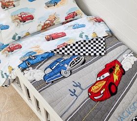 Disney and Pixar <em>Cars</em> Toddler Quilt Pixar Themed Room, Disney Cars Toddler Room, Cars Room Theme Little Boys, Cars Toddler Room, Car Theme Room, Disney Cars Bedroom Decor, Lightning Mcqueen Bedroom, Highway Background, Toddler Boy Room Themes