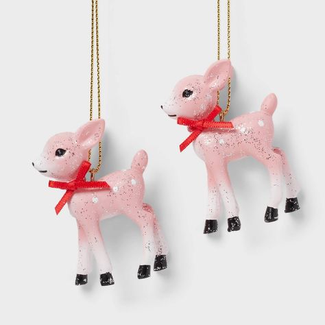 Add some forest friends to your holiday tree with this 2-Count Retro Small Deer Christmas Tree Ornaments from Wondershop™. This decorative ornament set includes two deer made of lightweight material. With a glitter finish, red scarves around their necks and black hooves, these small deer figures have a classically wintry look you'll love. They come with golden loops for easy hanging from a wall hook or your tree's branch. Wondershop™: Welcome to the Wondershop. Pink Vintage Christmas Decorations, Pink Retro Christmas, Reindeer Christmas Ornaments, Mini Christmas Tree Ornaments, Retro Pink Christmas, Mid Century Modern Ornaments, Mid Century Modern Christmas Ornaments, Pink Reindeer, Christmas Elves