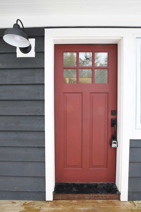 Grey Blue Siding, Grey House Front Door, Grey House With Red Door, Blue Siding Red Door, Dark Gray House With Red Door, Red Modern Farmhouse Exterior, Red Door Grey House, Front Door Colors With Blue Siding, Gray House Red Door