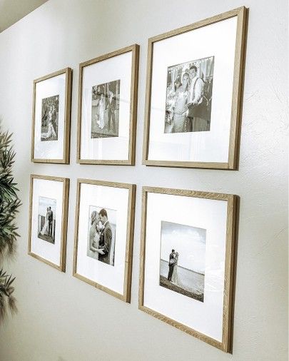 Six Photos On Wall, Light Wood Picture Frames On Wall, 6 Black And White Photos On Wall, Decorating With Black And White Photos, 8x10 Frames On Wall Ideas, 12x16 Picture Frame Wall, 8x8 Picture Frames, Gold Frame Black And White Picture, Brown Picture Frames On The Wall