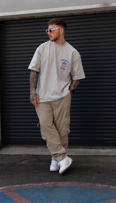 Neutral Colors Mens Outfit, White And Beige Mens Outfit, Neutral Streetwear Outfits Men, Drippy Men Outfits, Street Wear Poses Men, Beige Fits Men, Beige Cargos Outfits Men, Beige Aesthetic Outfit Men, Baggy Tshirt Outfit Men