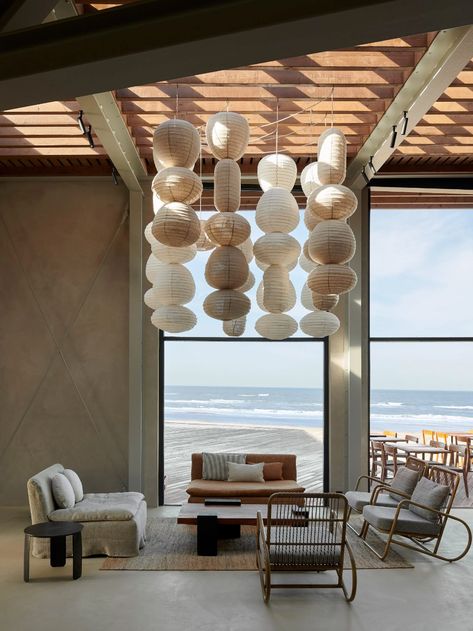 Natural materials feature throughout beach restaurant De Republiek Beachside Restaurant, Temporary Pavilion, Seaside Restaurant, Sustainable Interior Design, Nice Homes, Design Homes, Mugs Design, Chinese Lantern, Lantern Chandelier