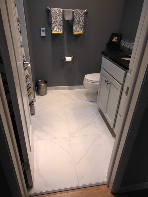 24x24" tile in small bathroom -- very minimal groutlines Tile Floor Bathroom Ideas, 12x24 Tile Patterns, Large Tile Bathroom, Tile Baseboard, Tile Bathroom Ideas, Large Floor Tiles, 12x24 Tile, Marble Bathroom Floor, Marble Tile Bathroom