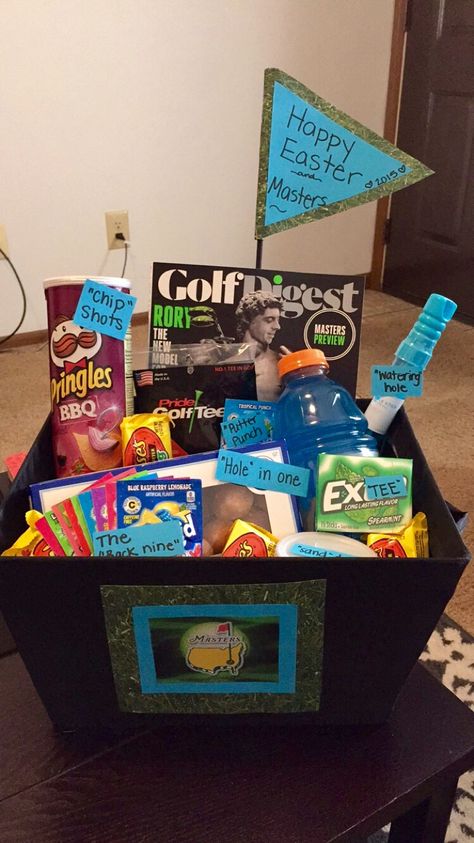 Easter/Masters basket for my boyfriend! He loves golf and the Masters tournament just so happens to start the day after Easter! Golf Easter Basket Ideas, Golf Outing Basket Ideas, Easter Gift For Boyfriend, Bf Easter Basket, Sports Basket For Boyfriend, Golf Outing Raffle Basket Ideas, Golf Basket Ideas For Men, Easter Basket Ideas For Boyfriend, Easter Basket For Boyfriend