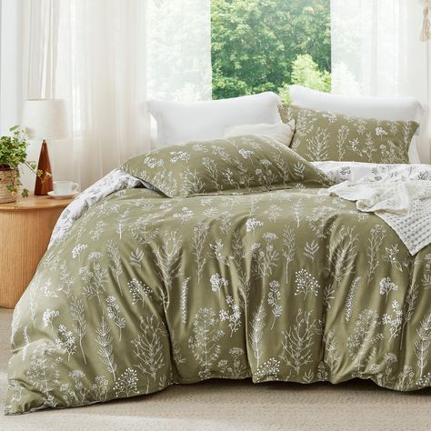 PRICES MAY VARY. Unique Reversible Design: This floral comforter set is reversible with contrasting colors. Simply flip the comforter or the pillow shams over to refresh your interior decor. The vivid floral and tree branch patterns add an elegant touch and a botanical vibe to your sleeping space. Optimal Comfort: Featuring Bedsure's thoroughly tested, high-grade down alternative filling blend to provide right warmth while ensuring optimal support, this polyester microfiber comforter set offers Botanical Bedding Sets, Cute Bed Sheets Green, Unique Comforter Sets, Green Bed Spreads, Forestcore Bedding, Dark Floral Bedding, Cute Comforter Sets, Bedroom Decor Sage Green, Olive Green Comforter