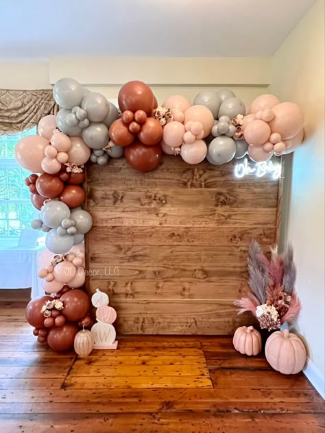 Baby girl shower, fall baby shower, pumpkin theme, baby shower balloons, fall baby shower, pumpkins, pampas, wood backdrop, wood wall, balloon garland, balloons and florals Fall Baby Shower Main Table, Fall Baby Shower Photo Backdrop, Fall Theme Baby Shower For Girl, Fall In Love Baby Shower Theme Girl, Boho Fall Baby Shower Ideas Girl, Fall Themed Baby Shower Ideas For Girl, Fall Baby Shower Balloon Arch, Fall Baby Shower Themes Girl, Fall Baby Girl Shower Ideas