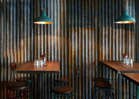 Industrial Restaurant Interior, Cladding Sheets, Cafe Industrial, Corrugated Metal Wall, Metal Wall Panel, Industrial Restaurant, Decoration Restaurant, Rustic Restaurant, Metal Cladding