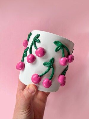 Coquette Pink Planters, Cute Ceramic Planter, Girly Pop Planter, Bow Decor, Modern ceramic planter, Boho home decor, plant lady gifts | MakerPlace by Michaels Pink Clay Ideas, Pop Art Ceramics, Pottery For Kids, Clay Flower Pinch Pot, Pink Planters, Ceramics Ideas Pottery Creative, Potery Clay Flowers On A Mug, Bow Mug Pottery, Funky Clay Vases