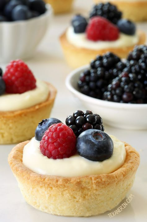 These cheesecake cookie cups have a sugar cookie crust and a delicious white chocolate cream cheese filling. Can be made with gluten-free, whole wheat or all-purpose flour. Chocolate Cream Cheese Filling, Berry Cookies, White Chocolate Cream, Berry 1st Birthday, Sugar Cookie Crust, Berry First Birthday, Chocolate Cream Cheese, Small Desserts, Cookie Cups