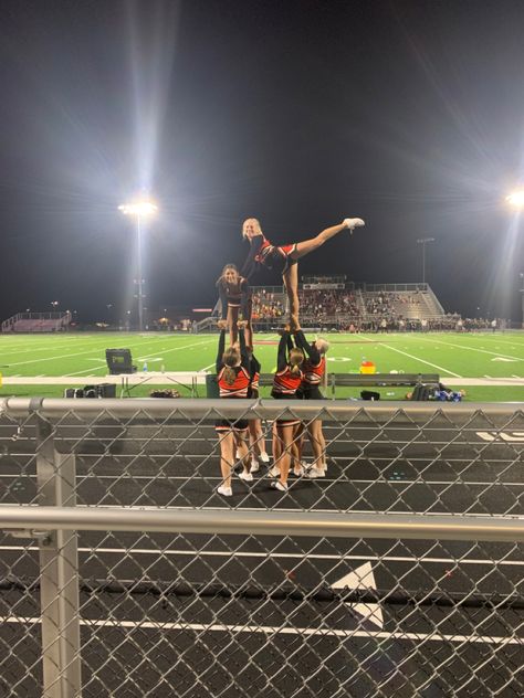 Cheerleading stunt at football game. Cheerleading Stunts Pictures, Sideline Cheer Stunts, Dance Stunts, Fnl Aesthetic, Fnl Cheer, Stunt Ideas, Easy Cheer Stunts, Football Cheerleading, Cheerleading Picture Poses