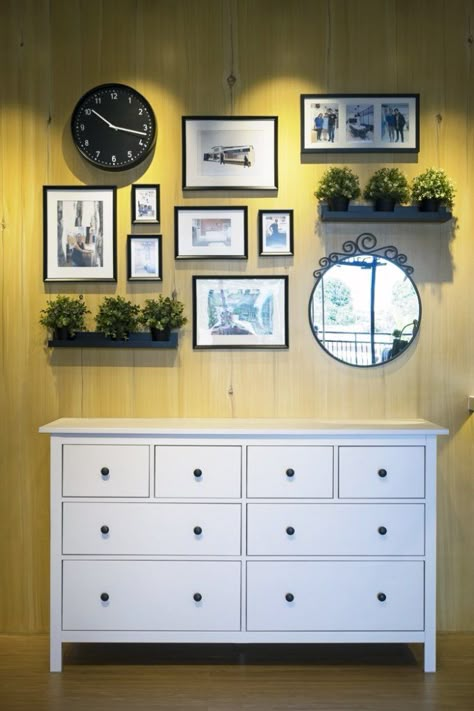 Photo Wall Collage Above Dresser, Wall Decor With Frames And Plants, Photo Wall With Clock, Photo And Mirror Wall Ideas, Plants And Photos Wall, Gallery Wall Mirror Center, Small Gallery Wall With Mirror, Picture And Plant Wall, Picture Wall With Clock In Middle