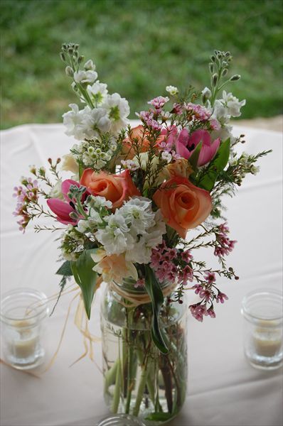 mason jar flower arrangement Mason Jar Floral Arrangements Wedding, Wedding Flowers Mason Jars, Mason Jar Centerpieces Spring, Wild Flowers In Mason Jars, Mason Jar Wedding Flowers, Flowers In Mason Jars Wedding, Floral Centerpieces For Party Simple, Mason Jar Flower Arrangements Wedding, Flower Jars Decoration