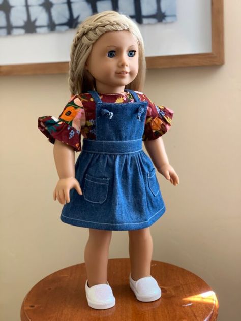 My daughter received an American Girl Doll for Christmas last year and I have been having so much fun sewing up little outfits for her. My five year old daughter loves being involved in the design process. We both agreed on a little denim pinafore dress and we love how it turned out. Best of all, I’ve provided the pattern as a free download plus a sew along tutorial for this post. Isn’t it cute? #doll #diy #dress #pinafore #free #tutorial American Girl Outfits, Clothes Makeover, Pinafore Dress Pattern, Pinafore Pattern, Dress Celebrity, Куклы American Girl, Doll Clothes Patterns Free, American Girl Doll Patterns, American Girl Doll Clothes Patterns