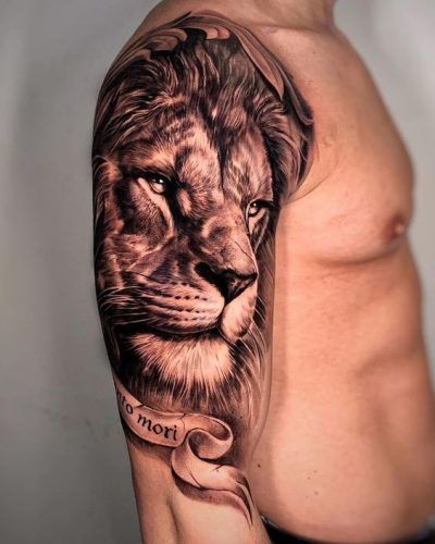 Discover Stunning Leo Tattoo Designs: 22 Inspirational Ideas for Zodiac Enthusiasts in 2024 Lion Angel Tattoo, Lion Tattoo Upper Arm, Lion Tattoo Arm, Lion With Crown Tattoo, Tattoo On Upper Arm, Leo Tattoo Ideas, Lion Arm Tattoo, Tattoo Upper Arm, Lion Shoulder Tattoo