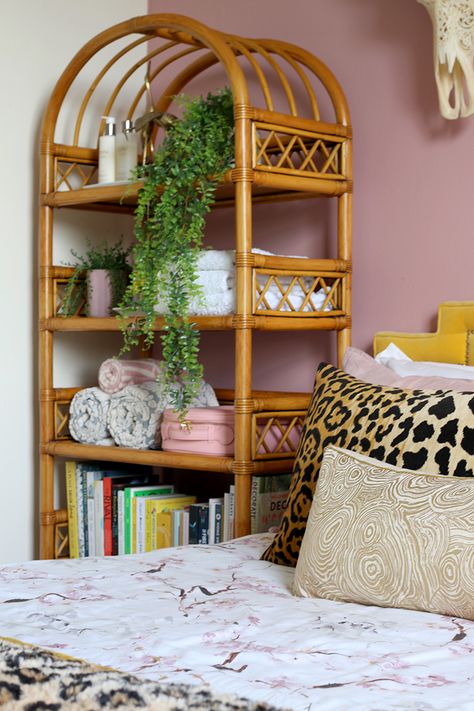 pink bedroom with vintage rattan shelving unit Rattan Arch Shelf, Boho Glam Dining Room, Rattan Shelving, Dining Room Boho, Rattan Shelves, Rattan Decoration, Rattan Bedroom Furniture, Rattan Bedroom, Eclectic Glam