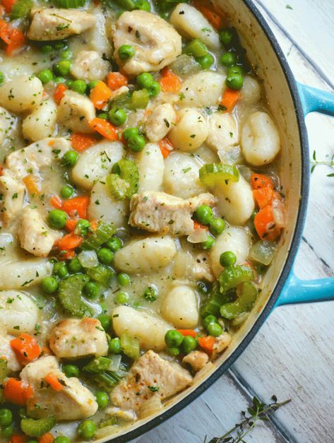 A chicken and dumpling skillet with gnocchi is a yummy shortcut on the classic that yeilds creamy comfort food your family will love! It is the perfect way to make a dumpling stew any night of the week. Chicken And Gnocchi Dumplings, Chicken Stew With Gnocchi, Chicken Gnocchi Stew, Chicken And Gnocci Instapot, Chicken And Dumplings Gnocchi, Gnocchi With Chicken Recipes, Chicken With Gnocchi Recipes, Chicken Gnocchi Pot Pie, Chicken And Dumplings With Gnocchi