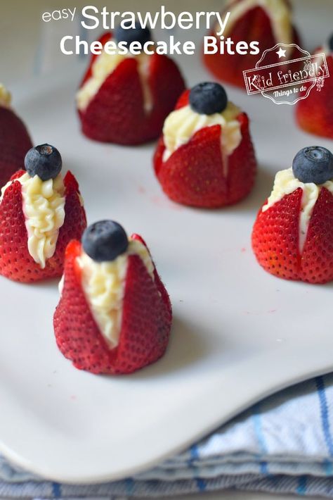 These No-Bake Strawberry Cheesecake Bites are the perfect finger food dessert. Decorate them with a blueberry for a fun patriotic or fun summer treat. www.kidfriendlythingstodo.com #strawberry #cheesecake #bites #recipe #fun #easy #treat #patriotic #dessert #fingerfood Finger Food Dessert, Strawberry Bites, Cookie Milkshake, Finger Food Desserts, Finger Desserts, Easy Strawberry Cheesecake, Chicken Casserole Dinners, Finger Foods For Kids, Strawberry Shortcake Cheesecake