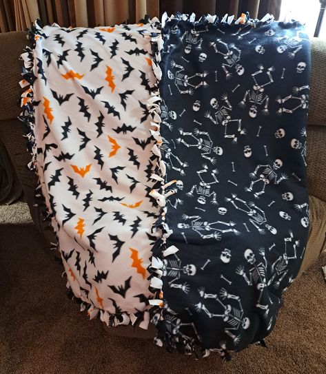 Handmade no sew fleece blanket  Blanket measures approximately 50 inches by 64 inches One side has white fleece fabric with orange and black bats and the other side is black fleece fabric with skeletons Please contact me with any questions  All sales go towards my cat Churro's medical expenses Halloween Hangout, Fall Sleepover, Knot Blanket, No Sew Fleece, Cowboy Wall Art, Halloween Bedding, No Sew Fleece Blanket, No Sew Blankets, Esv Bible