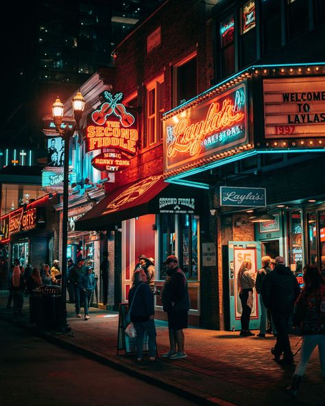 Neon signs on Broadway at night in Nashville, Tennessee Nashville Tennessee Aesthetic, Tennessee Aesthetic, Nashville Broadway, Fiddle Music, Rail Transport, Hotel Motel, Posters Framed, City Car, Music City