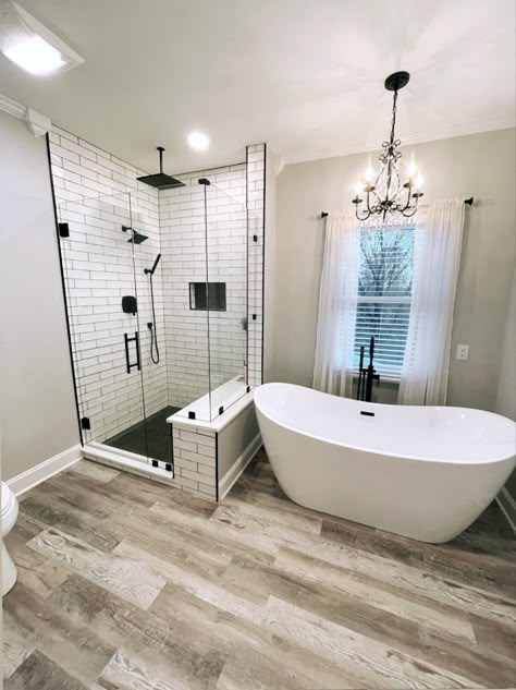 Tub With Chandelier, Shower With Black Fixtures, Tub In Shower Area, Farmhouse Tub, Matte Black Fixtures, Bathroom Renovation Cost, Small Master Bath, Texas Quilt, White Tile Shower