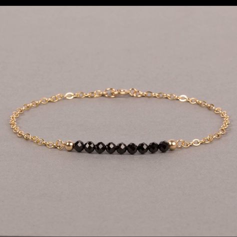 7” Inches Bar Bracelet This Elegant Black Spinel Bar Bracelet Is Handmade With 3.25mm Beautiful Faceted Black Spinel That Are Super Sparkly. It's Available In Sterling Silver And 14k Gold Filled With A Spring Ring Clasp. A Perfect Gift For A Teacher, A Hostess, A Birthday, Christmas! Great For Everyday Wear And Evenings Too! It Can Be Customized To Your Preference. Just Contact Me Anthropologie Bracelet, Gift For A Teacher, Sparkly Bracelets, Wire Bangle Bracelets, Plunder Jewelry, Tree Of Life Bracelet, Blue Beaded Bracelets, Bar Bracelet, Inspirational Bracelets