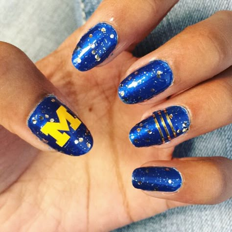 Michigan nails!   University of Michigan  nail design U Of M Nails, Michigan Football Nails, Michigan State Nails Designs, University Of Michigan Nails, University Of Michigan Nail Designs, University Of Oregon Nails, Michigan Wolverine Nails, Mn Vikings Nails, Michigan Wolverines Nails