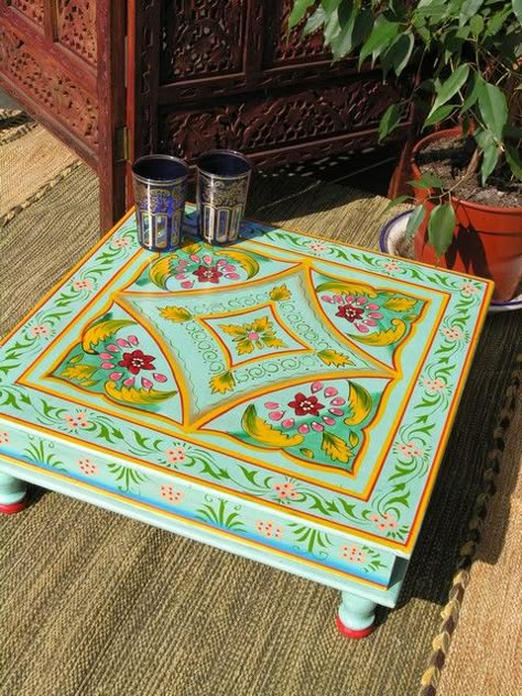 painted table idea. You can find pretty, low carved Indian tables and stools at www.bringingitallbackhome.co.uk Indian Table, Hantverk Diy, Unique Bed, Painted Coffee Tables, Indian Furniture, Unique Beds, Painted Chairs, Funky Painted Furniture, Indian Decor