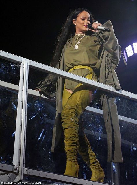 Legs eleven! Rihanna certainly has the figure to pull off such a risque… Rihanna Tour, Rihanna And Drake, Olive Green Jumpsuit, Celebrity Boots, Rihanna Outfits, Rihanna Photos, Rihanna Style, Tour Outfits, Bad Gal