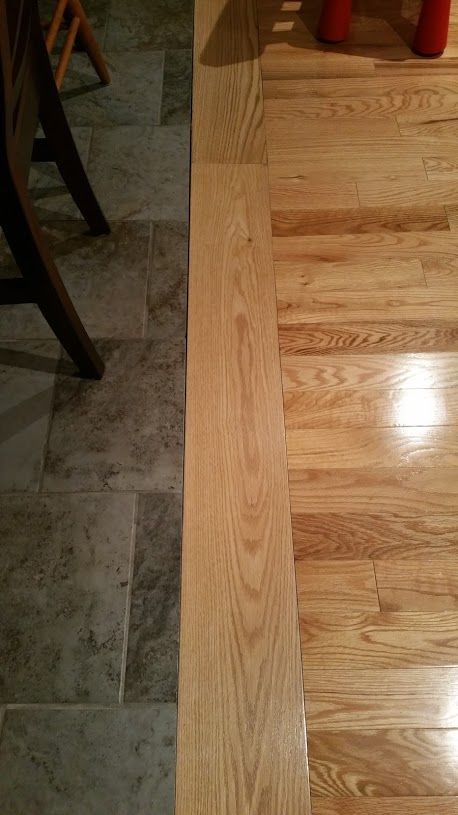 How can I create an "invisible" transition between different flooring types? - Home Improvement Stack Exchange Tile And Wood Floors, Tile To Wood Transition, Transition Flooring, Modern Flooring, Wooden Floor, Ceramic Floor, Living Room Flooring, Types Of Flooring, Wood Tile