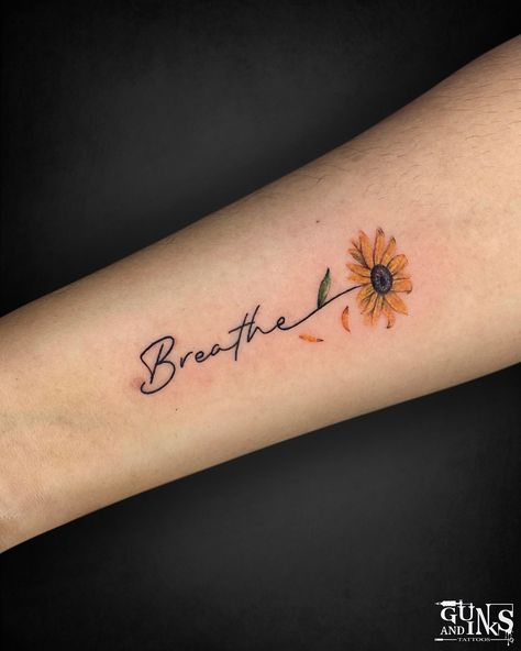 Minimal sunflower tattoo at @gunsandinkstattoos . . . . #sunflower #sunflowertattoo #breathetattoo #gunsandinkstattoos #besttattoostudioinhyderabad #tattoostudioingachibowli #hyderabad #gachibowli #femaletattooartist #tattootraining #tattootrainingcourse #tattootraininginstitute #smalltattoo #minimaltattoo #minitattoo #tattoostudioingachibowli #artist #artistsoninstagram #artoftheday #artstudio #hyderabadtattoostudio #hyderabadtattooartist #hyderabadtattoos #hyderabadtattooschool #indiatatt... Sunflower Breathe Tattoo, Sunflower Thumb Tattoo, Sunflower Signature Tattoo, Sunflower Tattoo With Name In Stem, Sunflower Tattoo Line Art, Sunflower Sister Tattoo, Sunflower Finger Tattoo, Minimal Sunflower Tattoo, Fineline Sunflower Tattoo