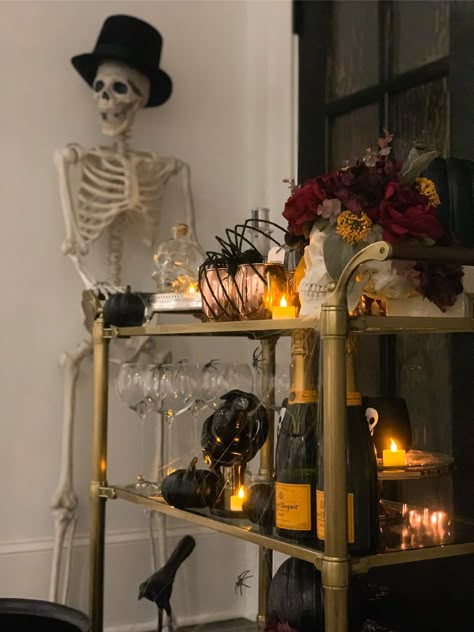 Halloween Bar Cart Ideas, Elevated Halloween Party, Glitter Halloween Decor, Holiday Bar Cart Styling, Classy Halloween Party Ideas, Spooky Bar Cart, Halloween Bar Setup, Halloween Bar Cart Decor, Halloween Bar Ideas