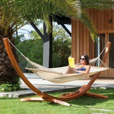 Do you still read a book just on the sofa at home? Do you still take a nap just on the lounge chair outdoors? AVAWING wooden hammock can satisfy you to enjoy a quiet leisure afternoon in your backyard or garden, whether it is in the shade of the tree, near the garden, backyard, or terrace. Relax, read a book, or just look at the clouds above your head. You can also use these wooden hammocks indoors as a permanent bed replacement for a deeper and more peaceful sleep. High Quality Hammock Large enough to accommodate 2 grown adults. Its designed to support up to 550 pounds. Made of polyester-cotton cloth that easily cleans up and dries quickly. Non-toxic fabric material, soft, breathable, and comfortable, weatherproof and oil proof, water resistant, and UV resistant. 14FT wood stand, the stur Cabin Patio, Wooden Hammock Stand, Wooden Hammock, Double Hammock With Stand, Hammock With Stand, Hammock Stands, Indoor Hammock, Camping Hammock, Outdoor Hammock