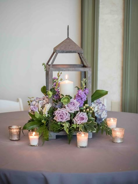 Floral Arrangement on a side table. Purple Wedding Centerpieces, Lantern Centerpiece Wedding, Romantic Rustic Wedding, Spring Wedding Decorations, Lantern Centerpieces, Meteor Garden 2018, Unique Wedding Flowers, Lilac Wedding, Lavender Garden