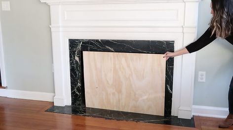 DIY Fireplace Cover Tutorial | eHow Wallpaper Fireplace Cover, Covering Up A Fireplace, Fireplace Covers Diy, Cover Up Fireplace Ideas, Covering A Fireplace Ideas, Diy Fireplace Cover Ideas, Fireplace Cover Up Ideas Diy, Fireplace Cover Ideas, Diy Fireplace Cover