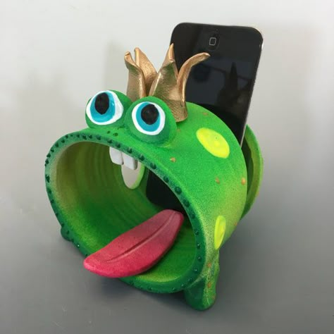 Cell Phone Speaker HolderCell Phone Desk Stand by PondScumCeramics ... Whimsical Office, Cell Phone Speakers, Ceramic Monsters, Iphone Holder, Desk Stand, Phone Stickers, Unique Business Cards, Phone Speaker, Ceramics Projects