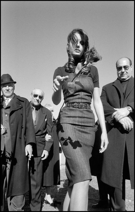 Mafia Funeral (2005) by Magnum Photos photographer Bruce Gilden. In 7 thematic sections – the seven deadly sins of fashion – Gilden painted a picture of our time in his Fashion Magazine. In the magazine 'POWER', the ephemeral (funerals) juxtaposed with outward signs of wealth as shown through the 'Mafia Funeral' in Queens, New York. Discover Magnum photographers' varied and distinctive documentation of everything fashion by clicking the above link. Bruce Gilden, 2005 Fashion, Mafia Gangster, Sofia Loren, Queens New York, Photographs Of People, Close Up Portraits, Magnum Photos, Foto Art